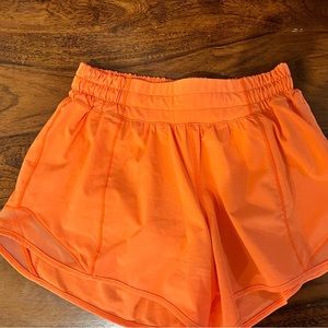 Lululemon Athletica Hotty Hot 4” shirts neon orange